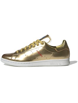 {{productViewItem.photos[photoViewList.activeNavIndex].Alt || productViewItem.photos[photoViewList.activeNavIndex].Description || 'Adidas Stan Smith Gold Metallic 2019'}}